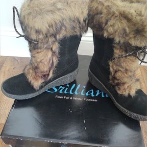 Black furry lace up boots.